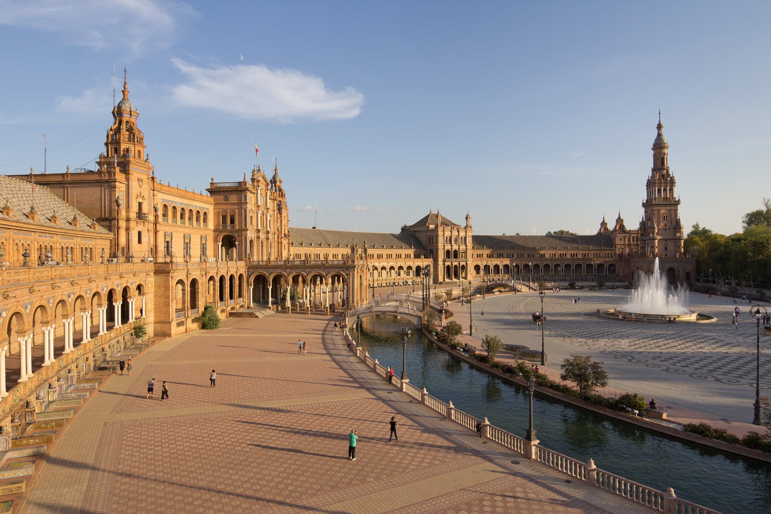 Golden arcades and canal at Plaza de España in Seville