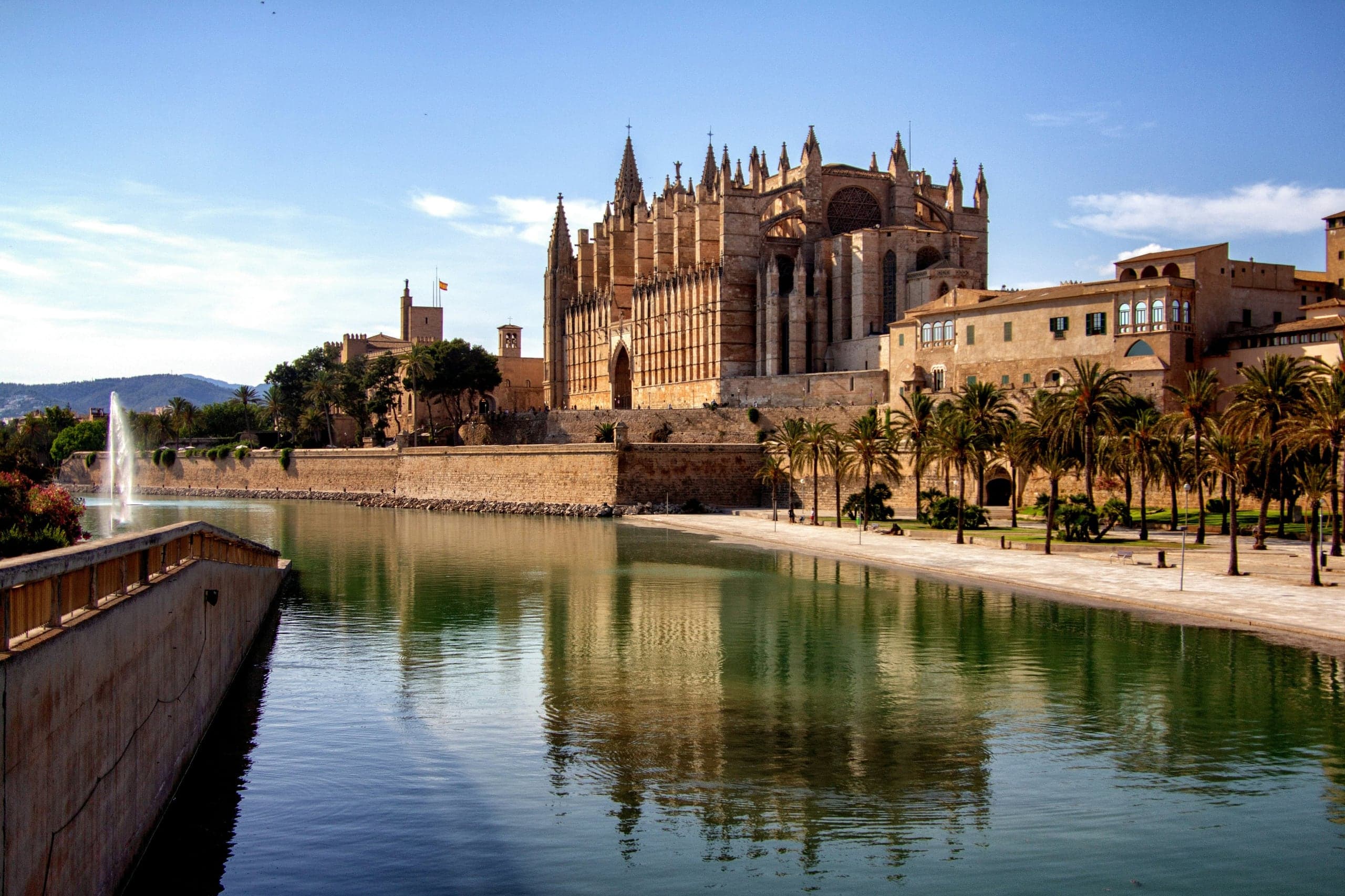 Palma Cathedral reflected in the still waters of Parc de la Mar